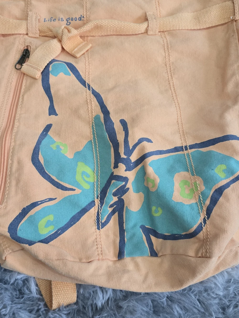 Life is Good Peach Butterfly Tie Backpack